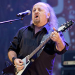 Bill Bailey with guitar